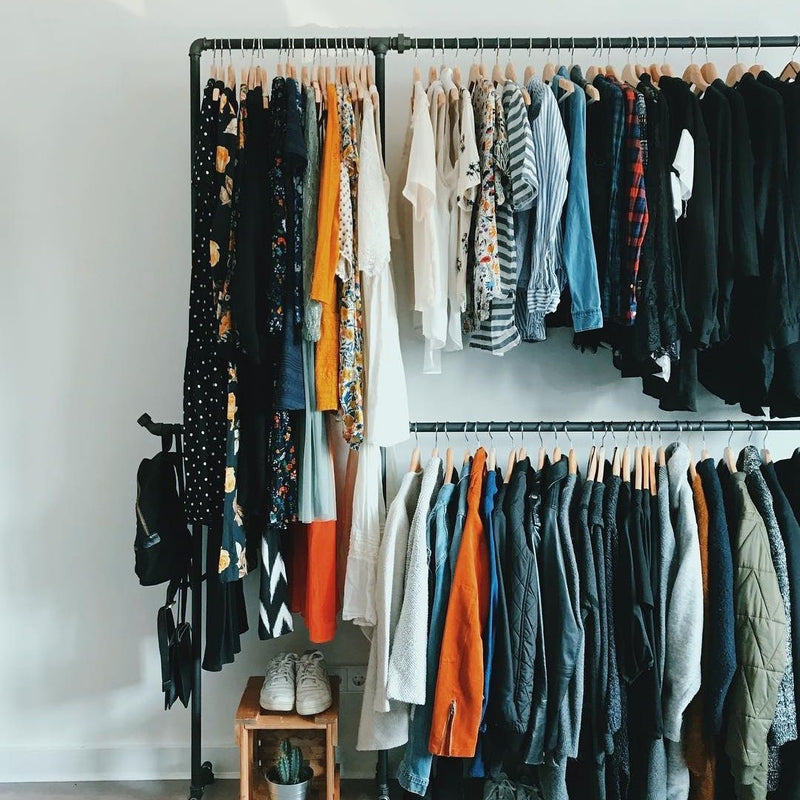 Free standing open wardrobe system cheap and sturdy clothes rack made from dark water pipes for a lot of clothes