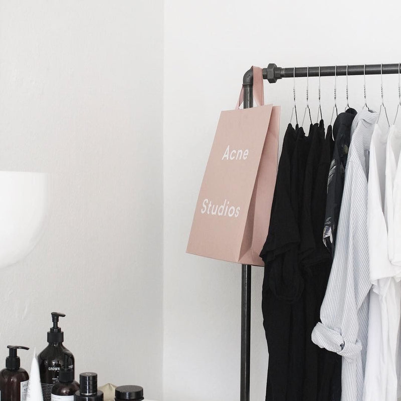 Clothes rack made from dark water pipes for hanging clothes on hangers open system for stores